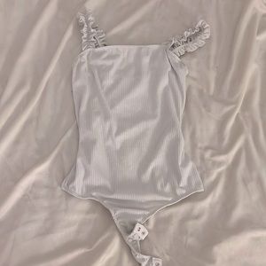 Size: S White Body Suit from Saints, never worn out just don’t like the straps